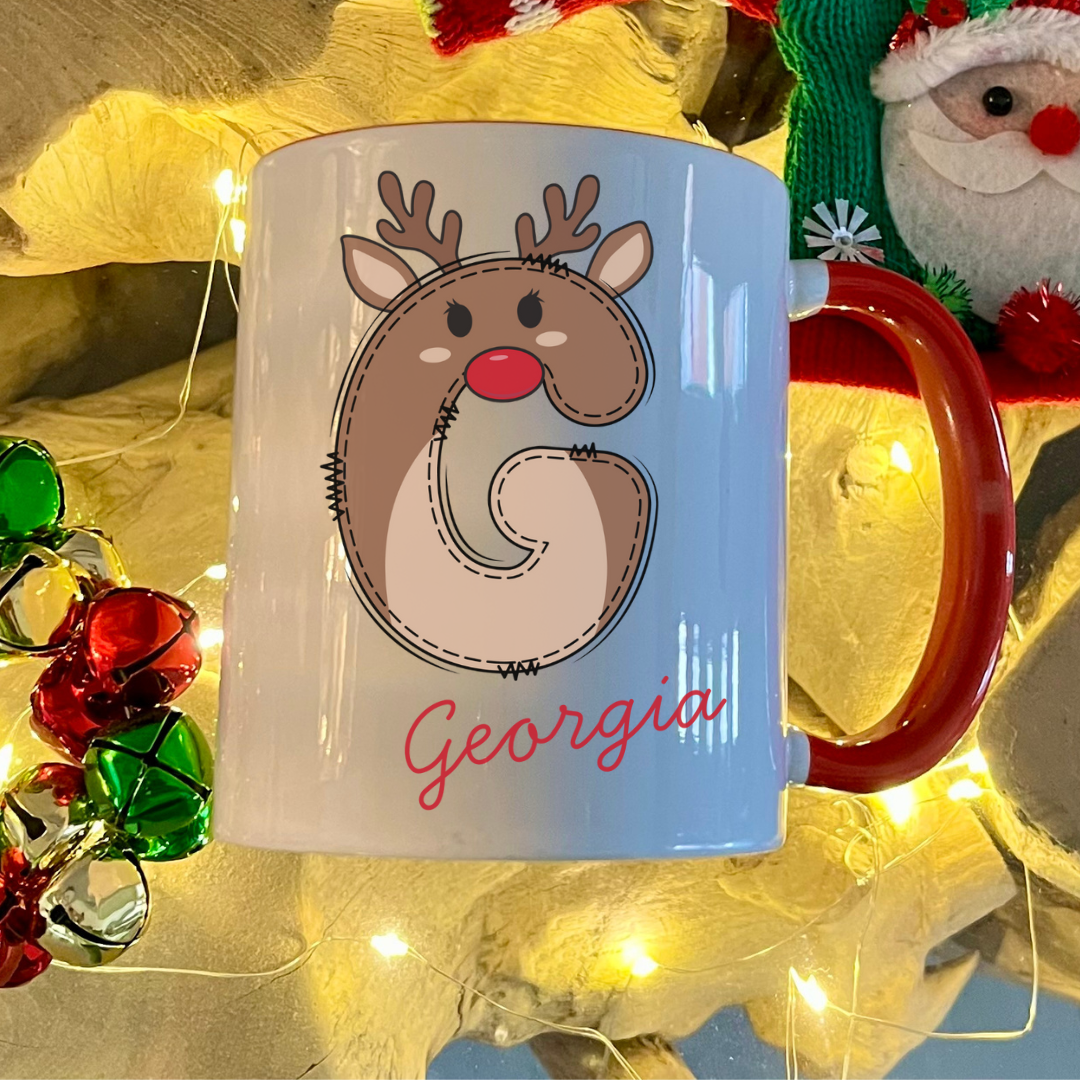 Personalised Red reindeer letter christmas mug filled with Cadbury Chocolates