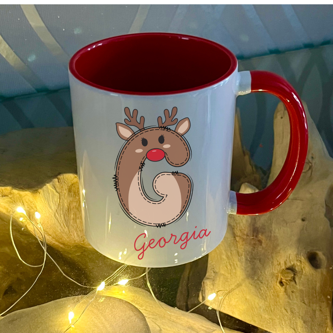 Personalised Red reindeer letter christmas mug filled with Cadbury Chocolates