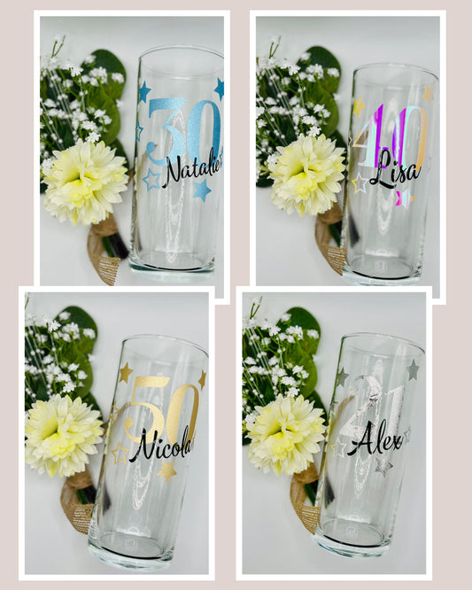 Personalised glass with decorative star design — custom name and age gift. Available in gold, silver, rose gold and more. Choice of gin glass, wine glass, shot glass or matching lit wine bottle. Unique keepsake for birthdays, celebrations or special occasions. Gift-wrapped with optional personalised tote bag.
