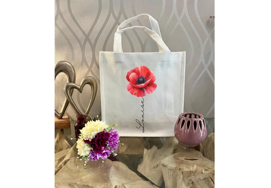 Personalised Red Poppy Mug & Gift Bag Set — custom name ceramic mug with vibrant red poppy design, red handle & interior, plus matching reusable eco-friendly linen gift bag. Perfect personalised gift for birthdays, thank yous, or special occasions. Handmade, thoughtful, and beautifully coordinated.