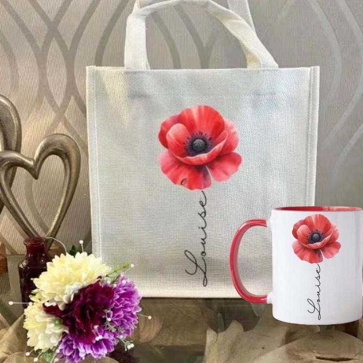 Personalised Red Poppy Mug & Gift Bag Set — custom name ceramic mug with vibrant red poppy design, red handle & interior, plus matching reusable eco-friendly linen gift bag. Perfect personalised gift for birthdays, thank yous, or special occasions. Handmade, thoughtful, and beautifully coordinated.