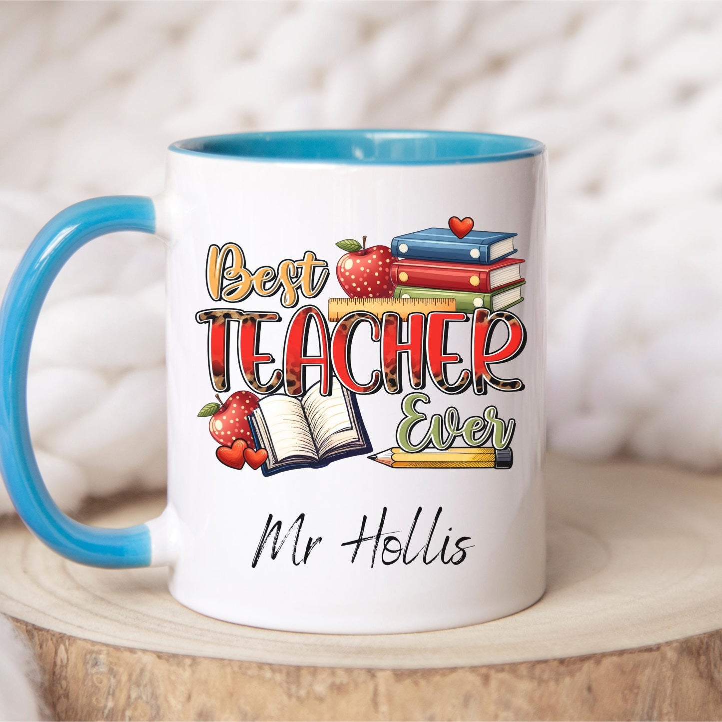 Fun and cheerful mug with the words “Best Teacher Ever” in bright, bold letters, surrounded by cute doodles of a books, shiny red apples, and a smiling yellow pencil. Teachers Gift. Under £10.