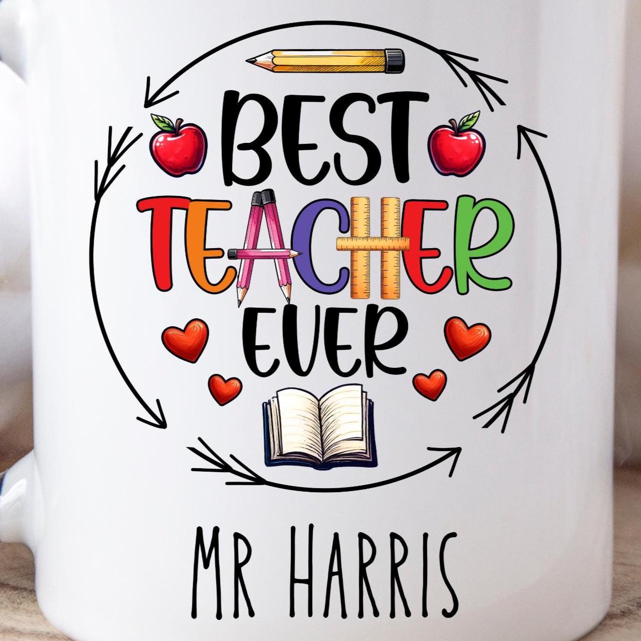 Fun and cheerful mug with the words βBest Teacher Everβ in bright, bold letters, surrounded by cute doodles of a books, shiny red apples, and a smiling yellow pencil. Teachers Gift. Under Β£10.