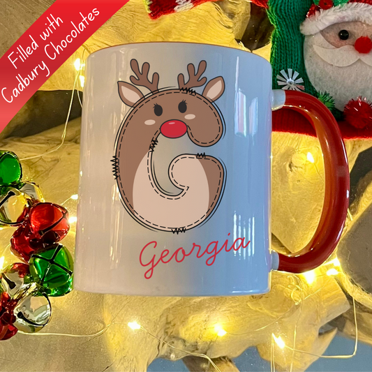 Personalised Red reindeer letter christmas mug filled with Cadbury Chocolates