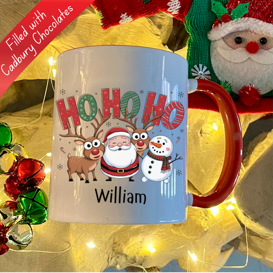 Personalised Red Ho Ho Ho Santa, reindeer & snowman christmas mug filled with Cadbury Chocolates