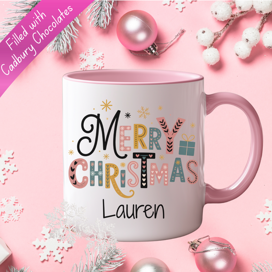 Personalised pink handled and pink insert Christmas Mug filled with chocolates