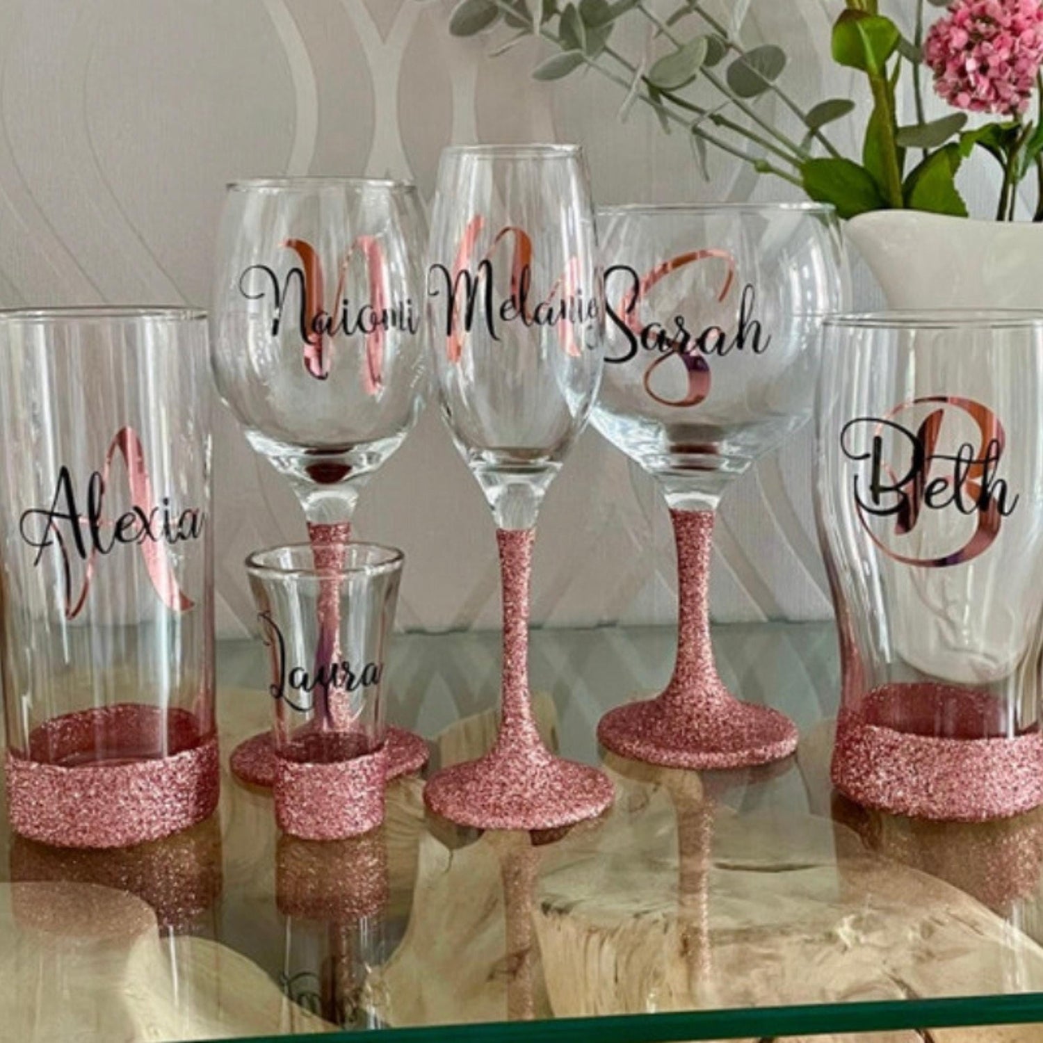 Glitter-bottomed personalised wine glass with monogram design. Ideal birthday gift for her – perfect for girls, mum, aunt, nan, gran or grandma. Great for 16th, 18th, 21st, 25th, 30th, 40th, 50th, 60th or 70th celebrations. Custom glass by Winney Hill