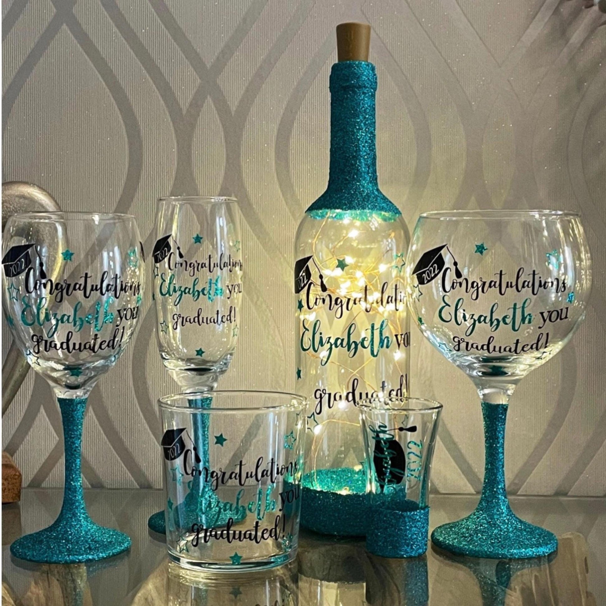 Graduation gift 2025 cePersonalised glitter graduation glass with custom name and year in sparkling vinyl. Ideal graduation gift or party keepsake. Choose from a variety of glitter colours. Perfect for celebrating and commemorating a special achievement in style. Graduation celebration glassware. Celebration gift for 2025
