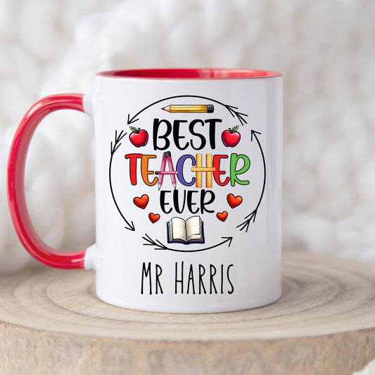 Fun and cheerful mug with the words “Best Teacher Ever” in bright, bold letters, surrounded by cute doodles of a books, shiny red apples, and a smiling yellow pencil. Teachers Gift. Under £10.